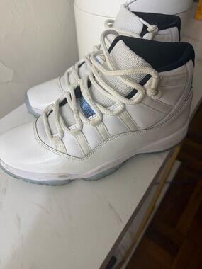Retro 11 Jordan Men’s White and Black High-Top Sneakers with Light Blue Accents